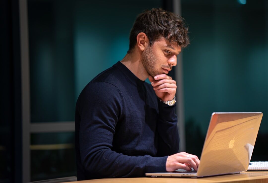 man using laptop for business networking